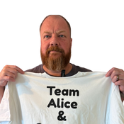 Photo of a t-shirt on a satisfied customer.